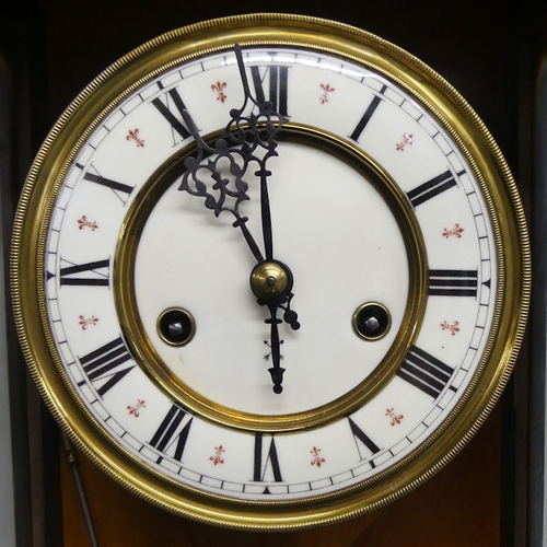 308 - A C.1885 mahogany Vienna Spring driven wall clock with carved horse finial. H85cm X W32cm. Collectio... 