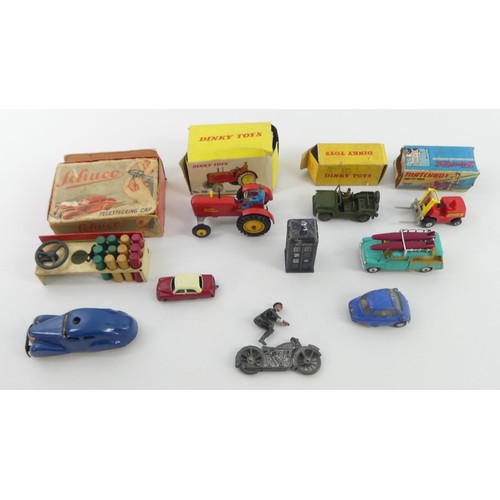 399A - A quantity of toys including boxed Schuco 
Telesteering car, boxed Dinky Massy Ferguson tractor No 3... 