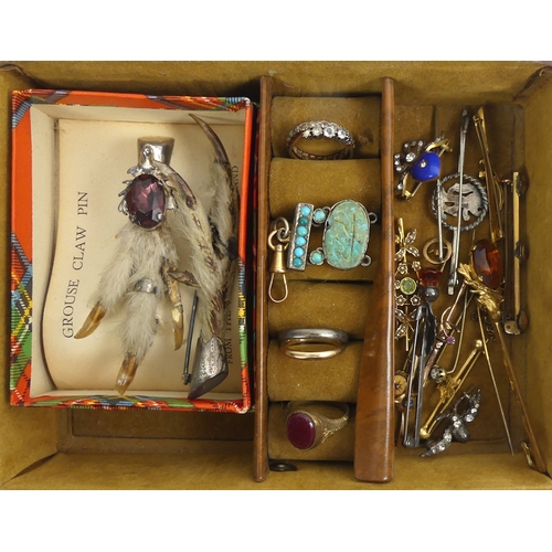 1 - A box of various jewellery items including stick pins and brooches.