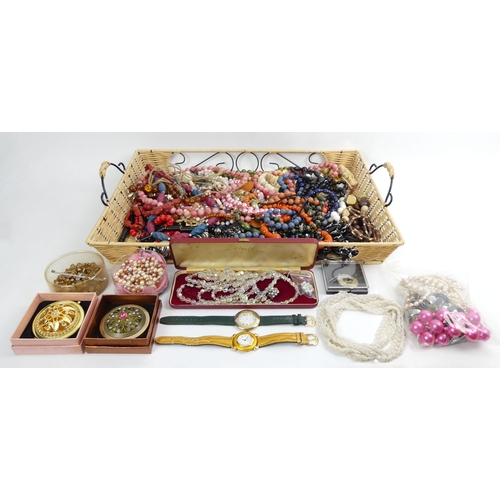 10 - A tray of costume jewellery, mostly bead necklaces.