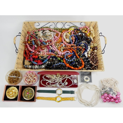 10 - A tray of costume jewellery, mostly bead necklaces.