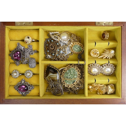 13 - A jewellery box and contents including silver items and watches.