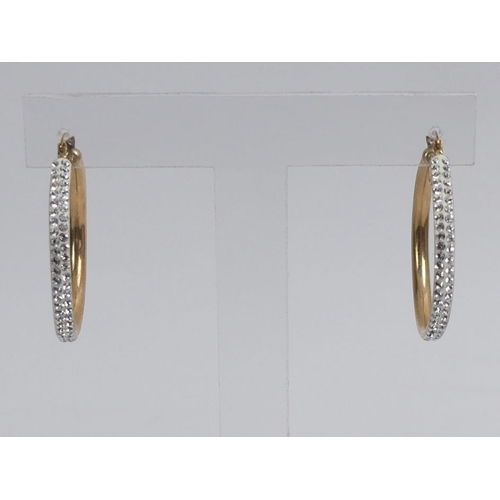 19 - A pair of 9ct gold crystal set hoop earrings, 2.3 grams, 32mm diameter.