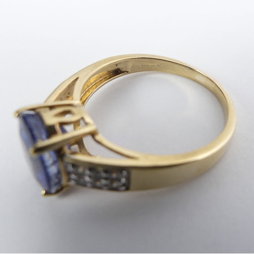 21 - 9ct gold sapphire and white topaz ring, 3.5 grams, 10mm, size P.