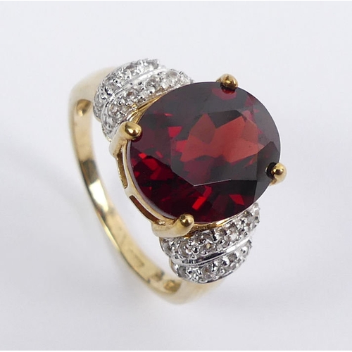 22 - 9ct gold, garnet and white topaz ring, 4.5 grams, size O 1/2.