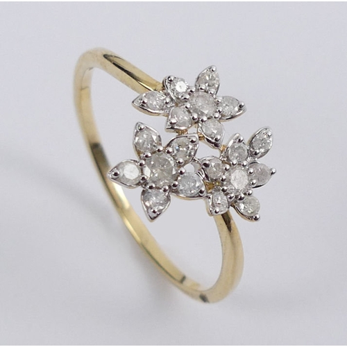 27 - 9ct gold diamond set floral design ring, 1.4 grams, 11.1mm, size P 1/2.