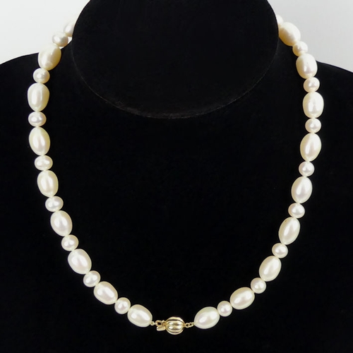 31 - Cultured oval and round pearl necklace with a 9ct gold clasp, 45 grams, 44cm x 8.7mm.