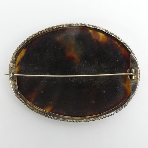 32 - Victorian tortoiseshell, mother of pearl inlaid silver brooch, 22 grams, 60mm x 82mm.