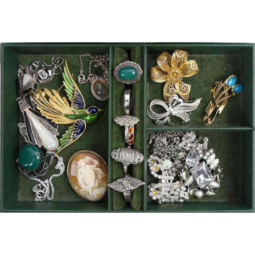 36 - A jewellery box of costume and silver items, including rings and brooches.