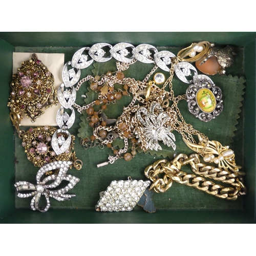 36 - A jewellery box of costume and silver items, including rings and brooches.