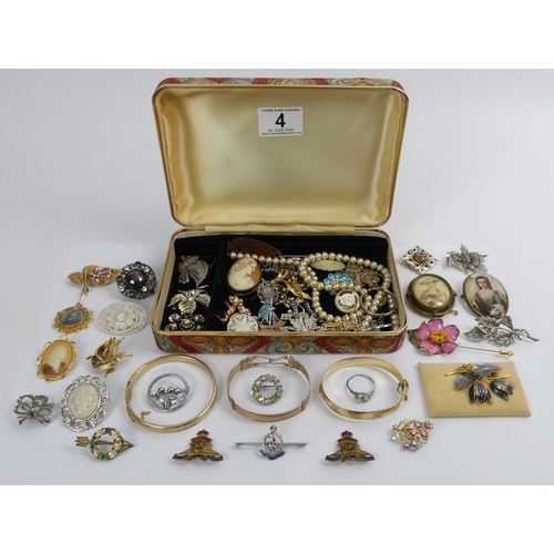 4 - A box of mixed costume jewellery including gold plated bangles.