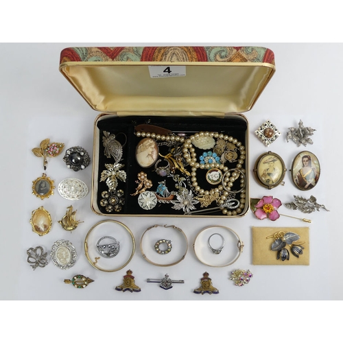 4 - A box of mixed costume jewellery including gold plated bangles.