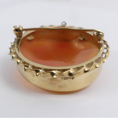 46 - 9ct gold, carved shell cameo brooch, 9.4 grams, 25mm x 45mm.