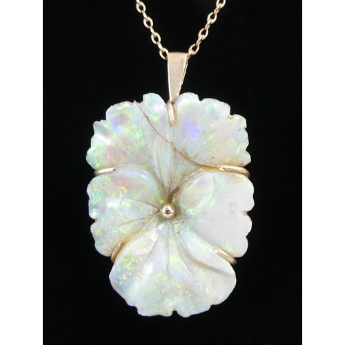 7 - 9ct gold carved opal flower design pendant and chain, 5.7 grams, chain 48cm, pendant 30mm.