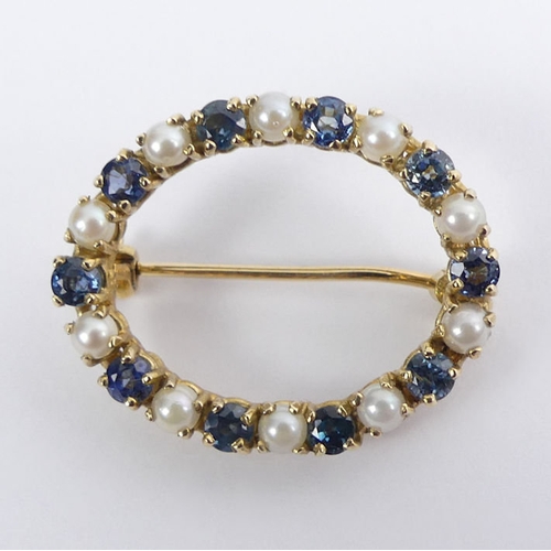 9 - 9ct gold sapphire and cultured pearl brooch, 4.4grams, 21.5 x 26.5mm.