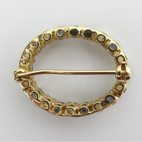 9 - 9ct gold sapphire and cultured pearl brooch, 4.4grams, 21.5 x 26.5mm.