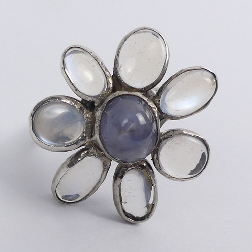 50A - Sterling silver moonstone flower design ring, 6.8 grams. Size S 1/2, 26.5 mm wide.