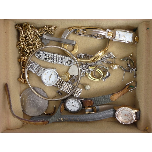 53 - A jewellery box and contents including silver rings and ladies watches.