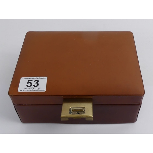 53 - A jewellery box and contents including silver rings and ladies watches.