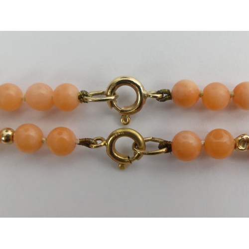 58 - 9ct gold coral bead necklace and matching bracelets, 12.8 grams, beads 4.1mm, necklace 41cm.