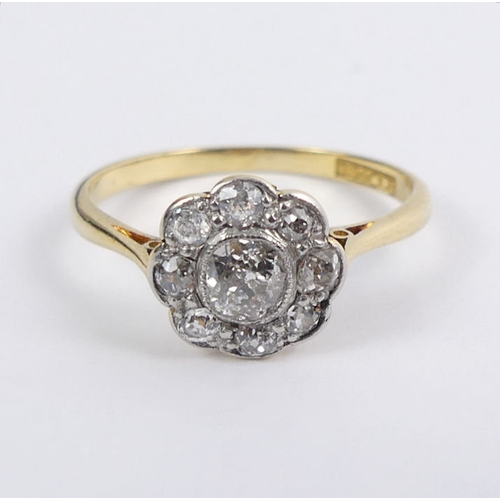 65 - 18ct gold diamond daisy ring, 1.7 grams, 8.5mm, size J 1/2.