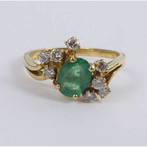 69 - 18ct gold, emerald and diamond ring, 3.4 grams, 10mm, size N.