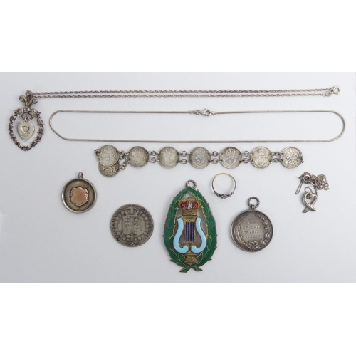 70A - Various items of silver jewellery and coins, including a minstrel enamelled jewel, 102 grams.