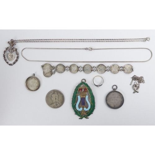 70A - Various items of silver jewellery and coins, including a minstrel enamelled jewel, 102 grams.