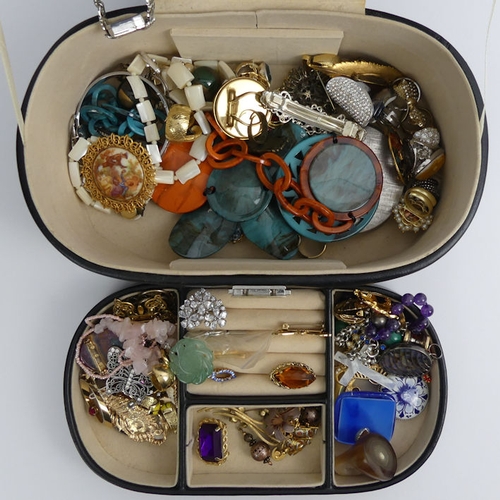 70B - A jewellery box and contents, including a rose quartz and jade necklace.