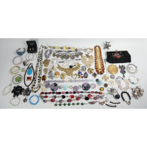 70C - A hat box of mixed costume jewellery, including an ornate paste set necklace.