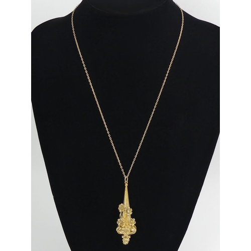 70E - 9ct gold ornate pendant and 9ct chain, 5.3 grams, chain 52cm, pendant 65mm.