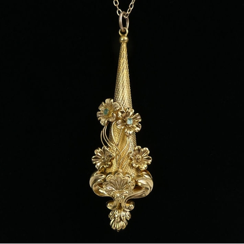 70E - 9ct gold ornate pendant and 9ct chain, 5.3 grams, chain 52cm, pendant 65mm.