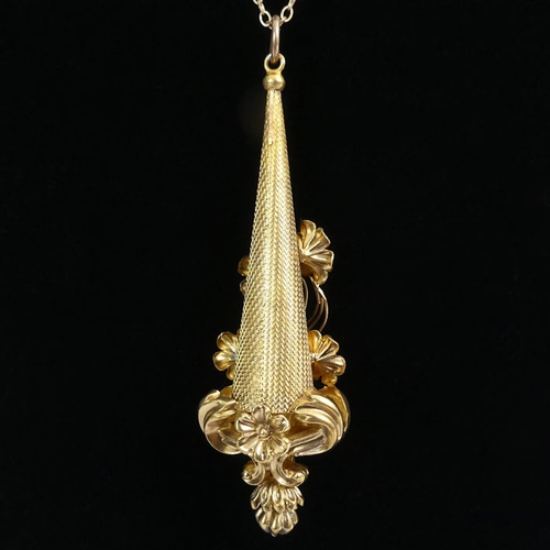 70E - 9ct gold ornate pendant and 9ct chain, 5.3 grams, chain 52cm, pendant 65mm.