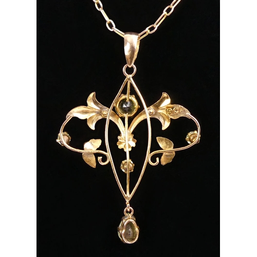 73 - 9ct gold peridot pendant and chain, 3.1 grams, chain 42cm, pendant 42mm.