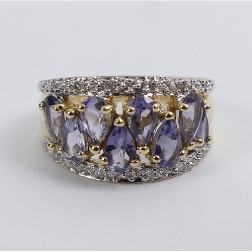 77 - 9ct gold tanzanite and diamond ring, 4.1 grams, 10.8mm, size K.