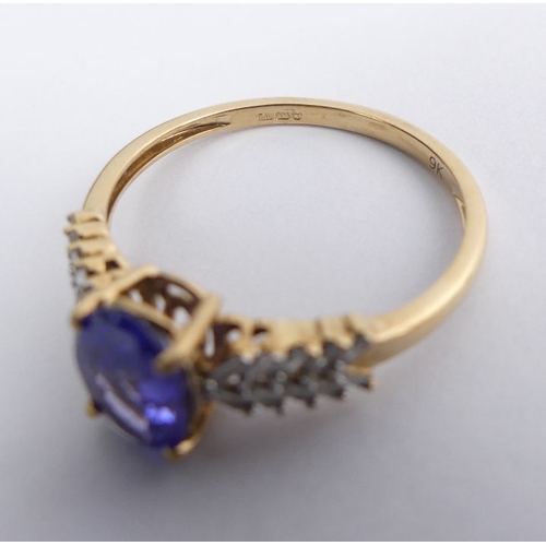 82 - 9ct gold tanzanite and diamond ring, 1.8 grams, 7.9mm, size Q.