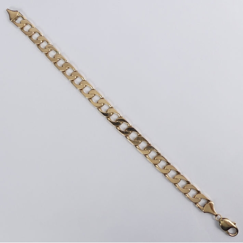 85 - 9ct gold solid flat curb link bracelet, 34.4 grams, 9.5mm x 23.5cm.