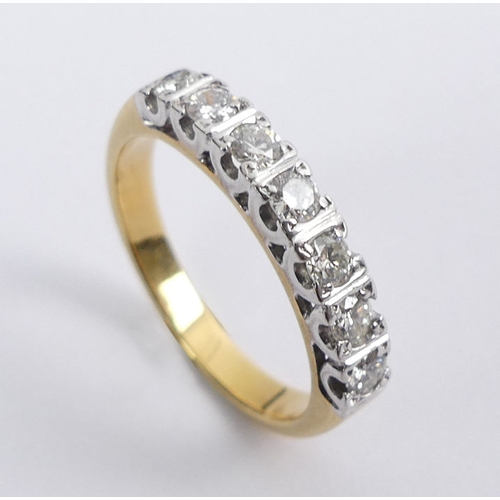 86 - 18ct gold (tested) Seven stone diamond ring, 3.2 grams, 3.1mm, size K.