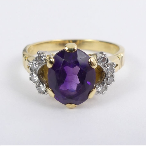 87 - 18ct gold, amethyst and diamond ring, 4.8 grams, 11mm, size P.