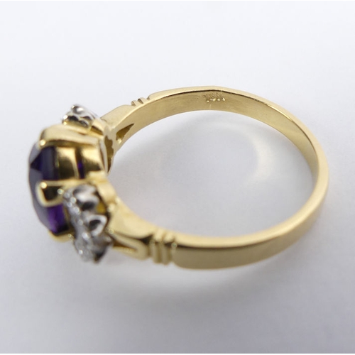 87 - 18ct gold, amethyst and diamond ring, 4.8 grams, 11mm, size P.