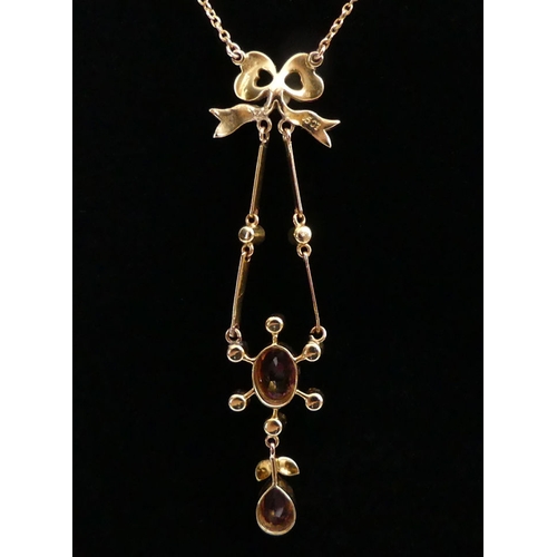 88 - 15ct gold, pink tourmaline? and seed pearl pendant necklace, 4.1 grams, 39cm, pendant 5cm.