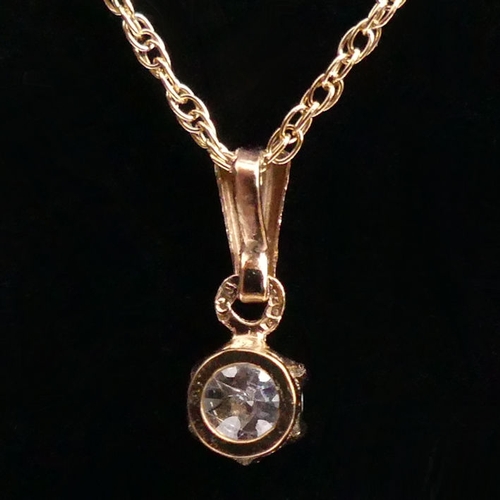 89 - 9ct gold, diamond (approximately .5ct) pendant and chain, 2.3 grams, chain 45cm, pendant 6mm diamete... 