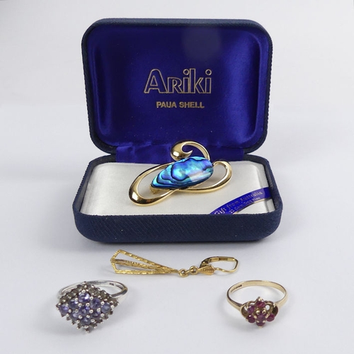 91 - 9ct gold ruby ring, silver and tanzanite ring, one earring and gold plated brooch.