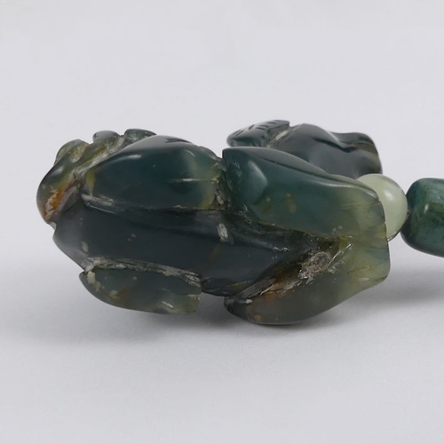 93 - Carved Chinese jade/nephrite and turquoise bead necklace with a temple lion pendant, 138 grams, bead... 