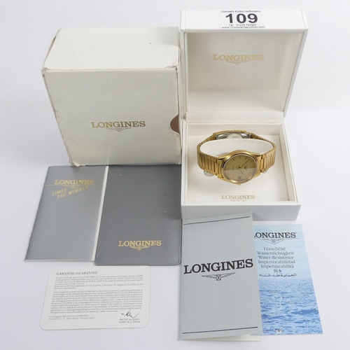 109 - Longines gold tone, automatic date adjust watch and box, 35.2mm.
Condition Report:
In working order.