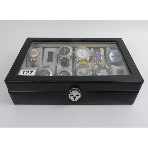 127 - A twelve watch box, including replica and other watches.