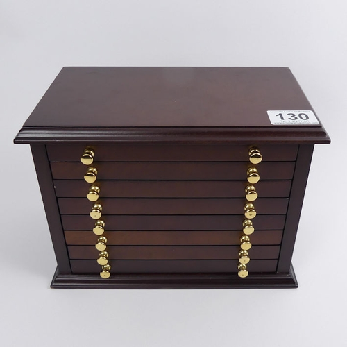 130 - A mahogany collectors cabinet, containing British coins of WWII, cabinet 18cm x 25cm x 14cm.
In good... 