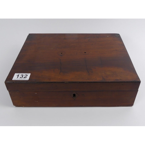 132 - A mahogany box of mixed British and foreign coins, including some silver examples.