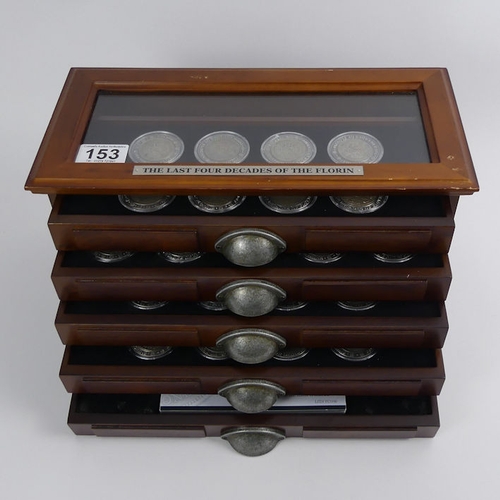 153 - A coin collectors cabinet containing four decades of Florins, 1930 - 1967.