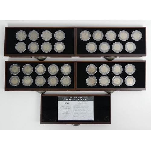 153 - A coin collectors cabinet containing four decades of Florins, 1930 - 1967.